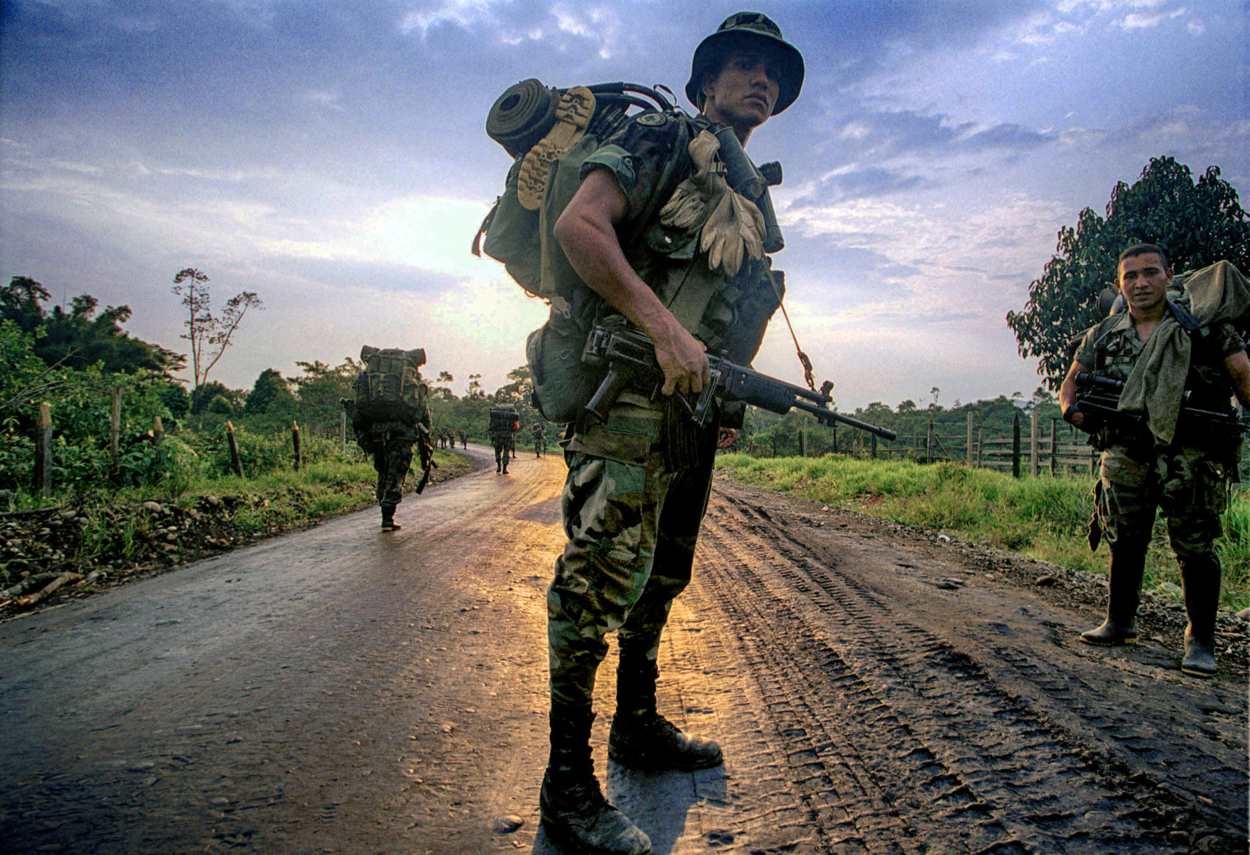 Colombian anti-narcotics military personnel on a dawn patrol through the Putumayo region.